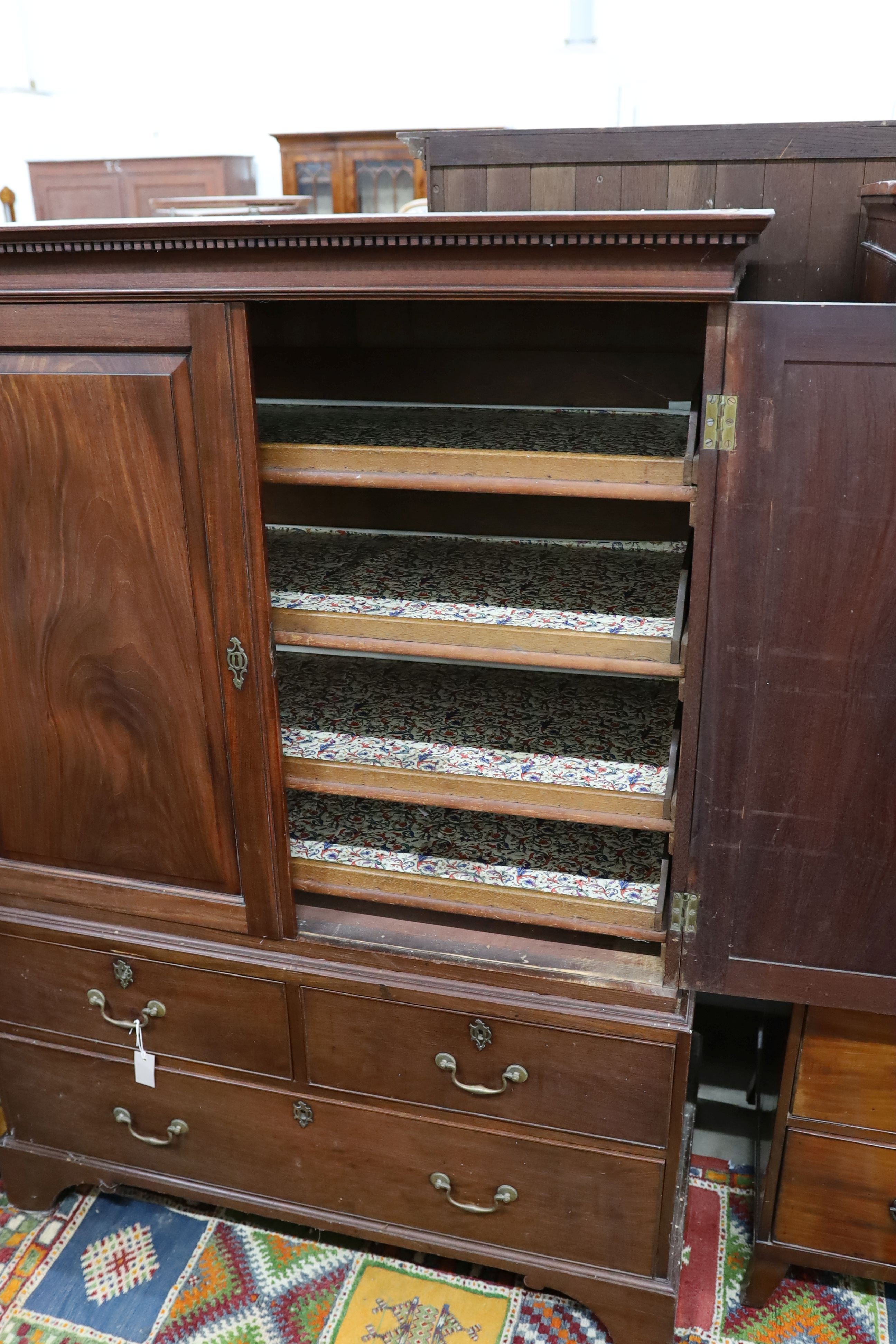 A George III mahogany linen press, length 125cm, depth 64cm, height 174cm